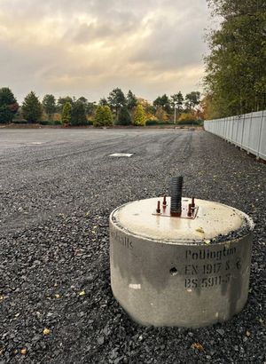 Detailed view of reinforced concrete foundation base with steel fittings at the Copart Dunfermline operations centre site